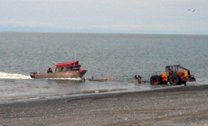 tractorpull1 Unloading Halibut boat in ocean